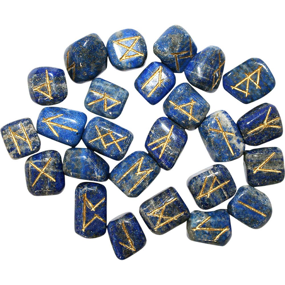 Set of lapis lazuli stones with gold runes on a white background