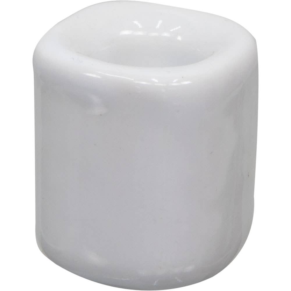 white candle holder on a white background