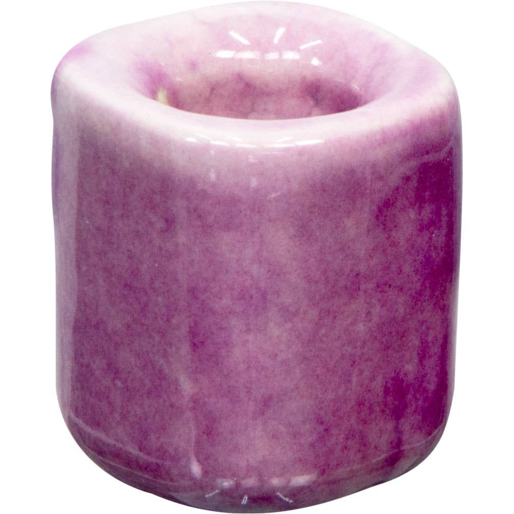 Purple marble-patterned candle holder on a white background