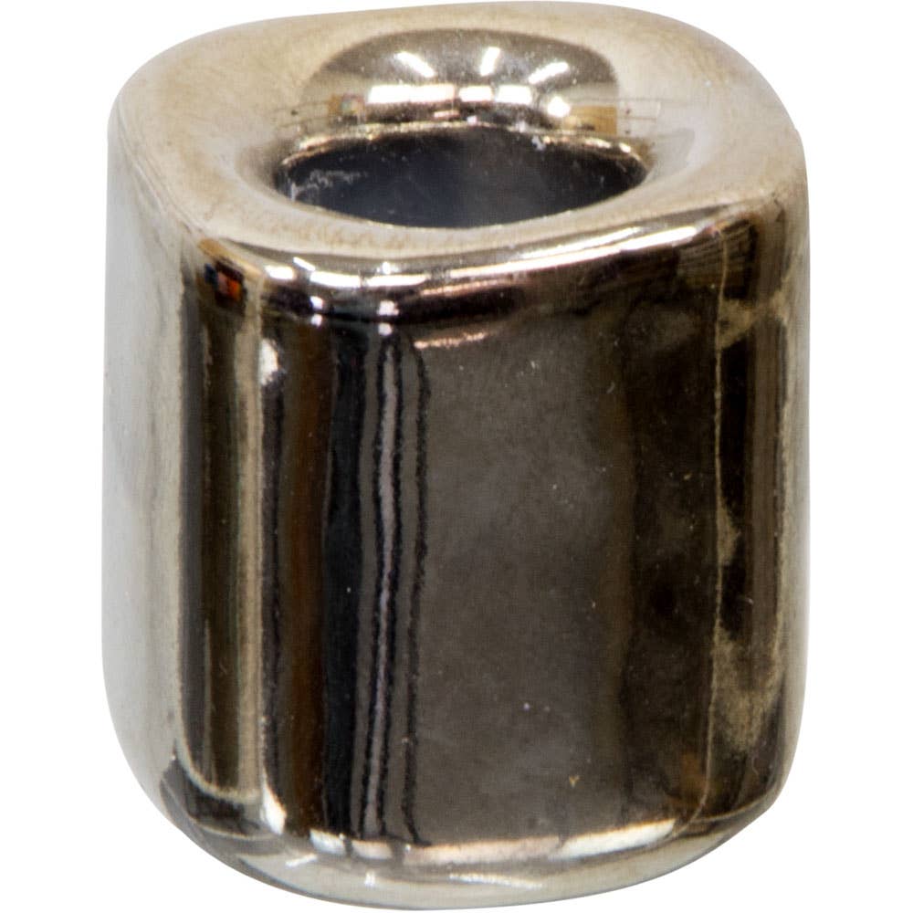 silver-colored candle holder on a white background