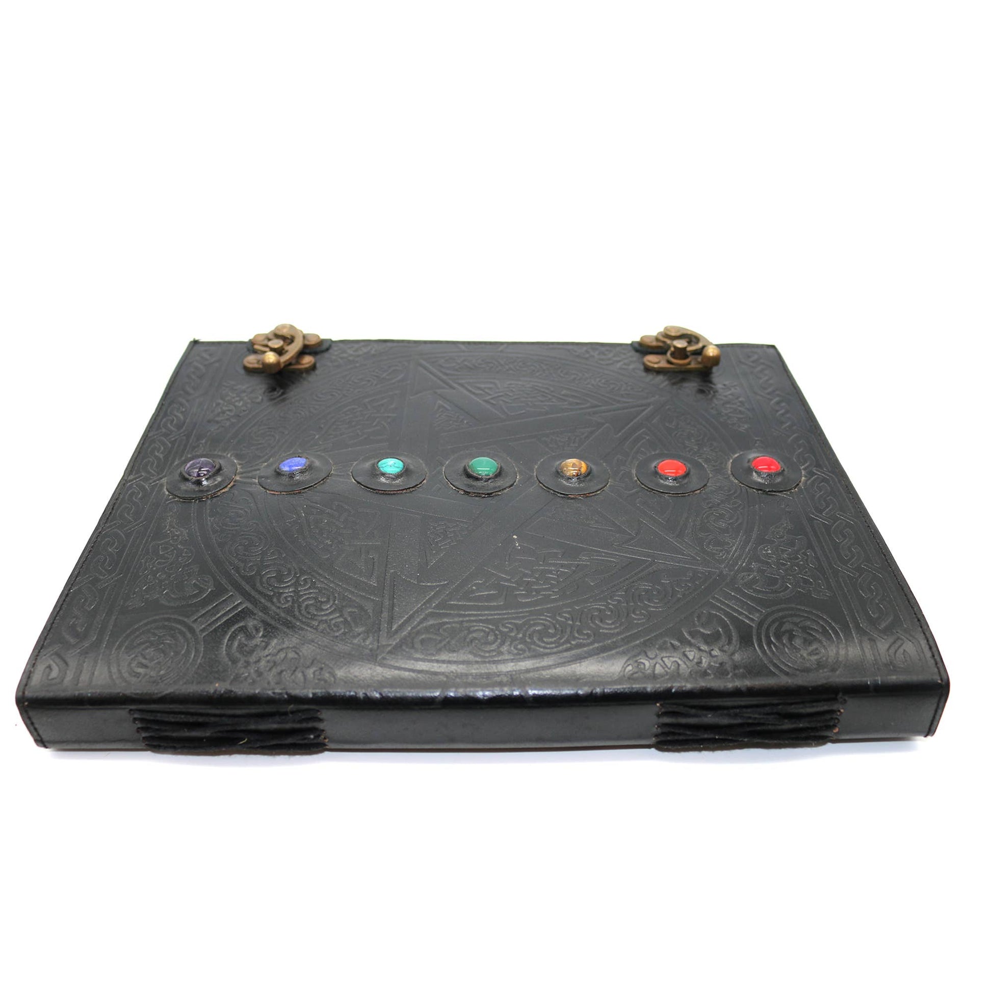 Black leather journal with embossed designs and chakra stones