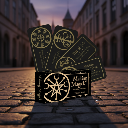 Set of tarot cards with symbols on a brick street at dusk