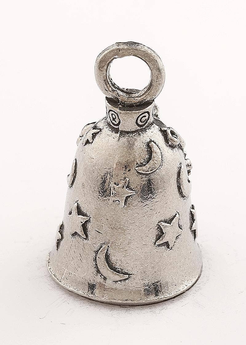 Silver bell with star and moon designs on a white background