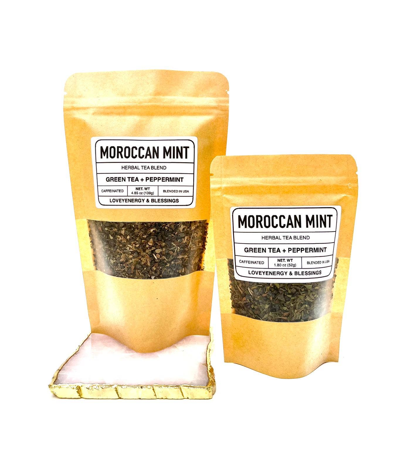 Two packages of Moroccan Mint tea on a white background
